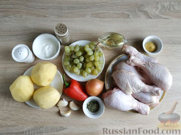 Курица, запечённая в духовке с овощами и виноградом